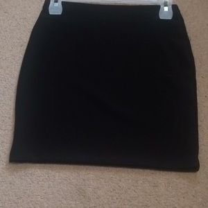 Black mini skirt. Never worn